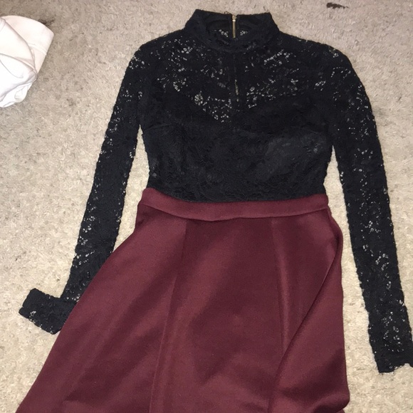 maroon top with black skirt